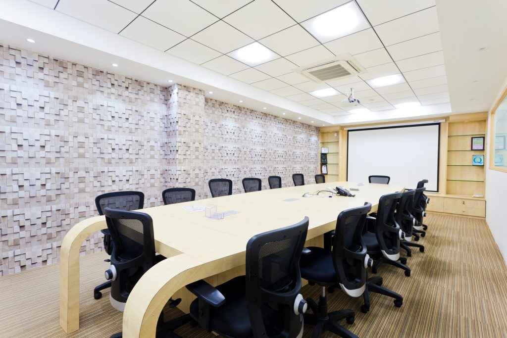 modern office interior design trends in Bangalore with smart workspace and lighting